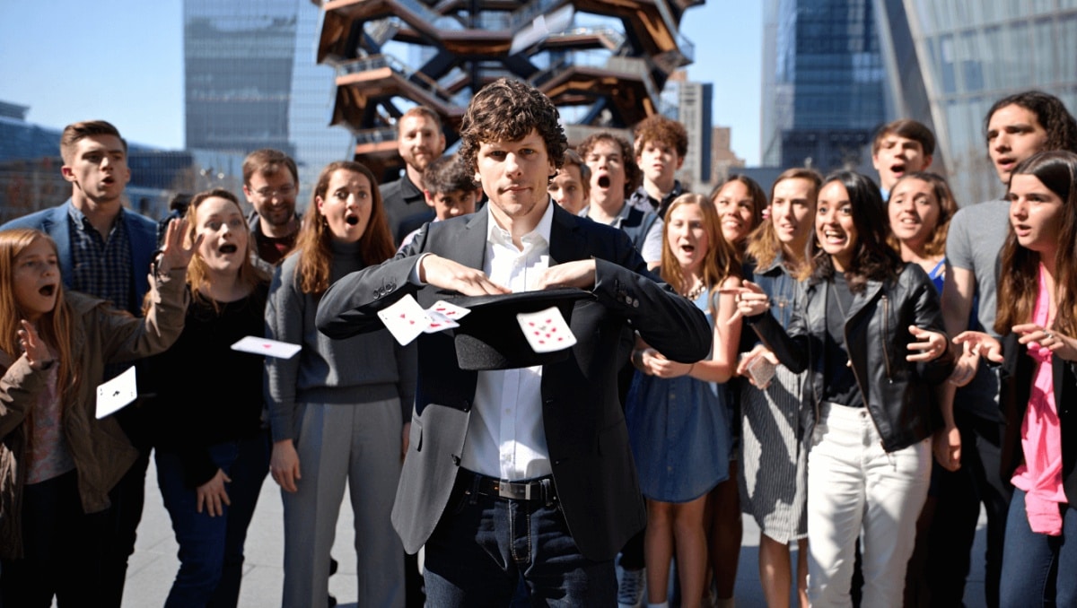 Jesse Eisenberg performs a magic trick ahead of the release of "Now You See Me: Now You Don