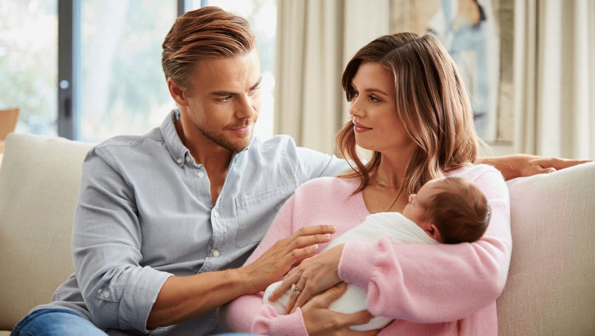 Hayley Erbert and Derek Hough with their newborn