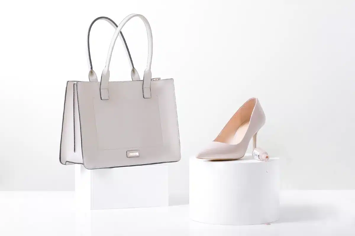 Minimalist outfit with neutral tones and a bold accessory detail