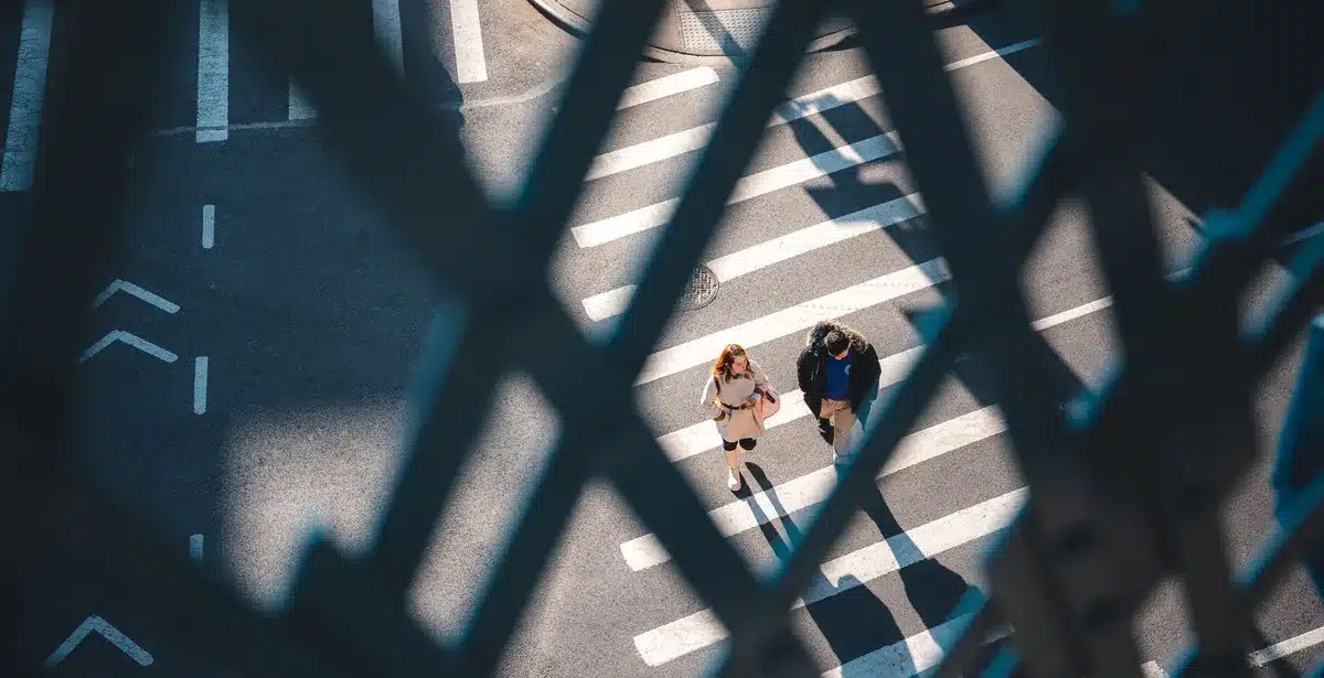 Well-dressed people walking through busy Manhattan streets and urban neighborhoods