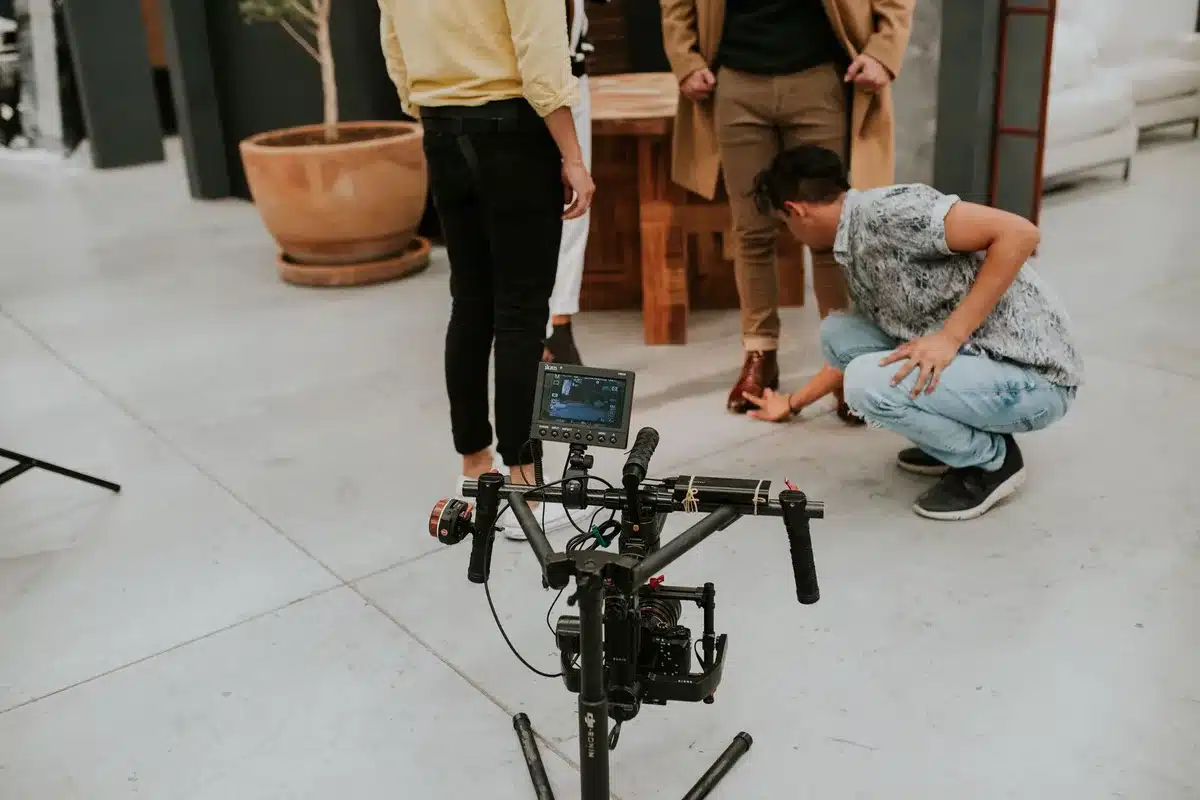Production team members in a meeting discussing scheduling and strategy