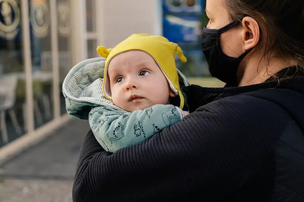 Parent and child walking together on a quiet suburban street, symbolizing family guidance and protection