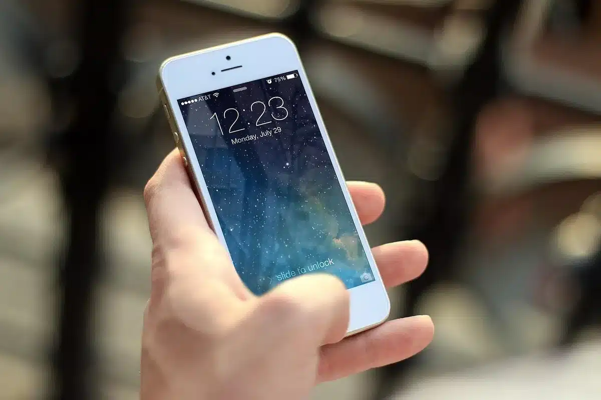 Person navigating Google app settings on a smartphone