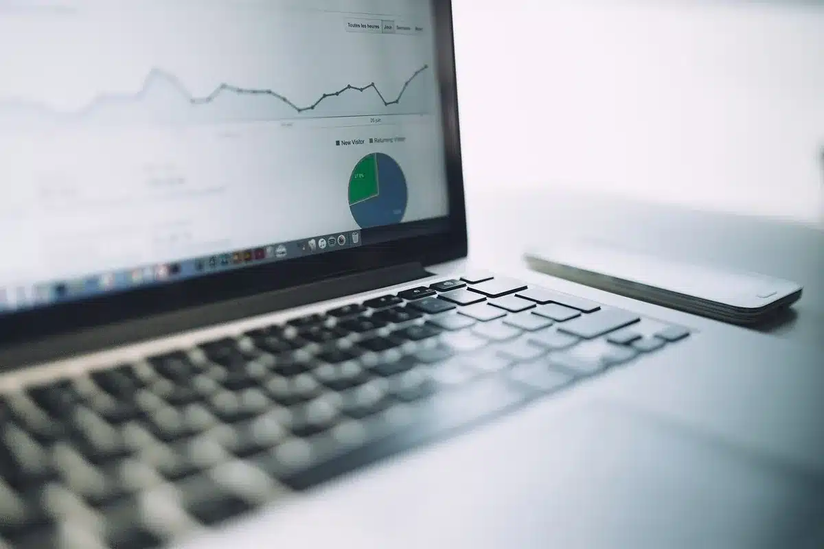 Desktop showing publisher analytics with charts tracking ad revenue
