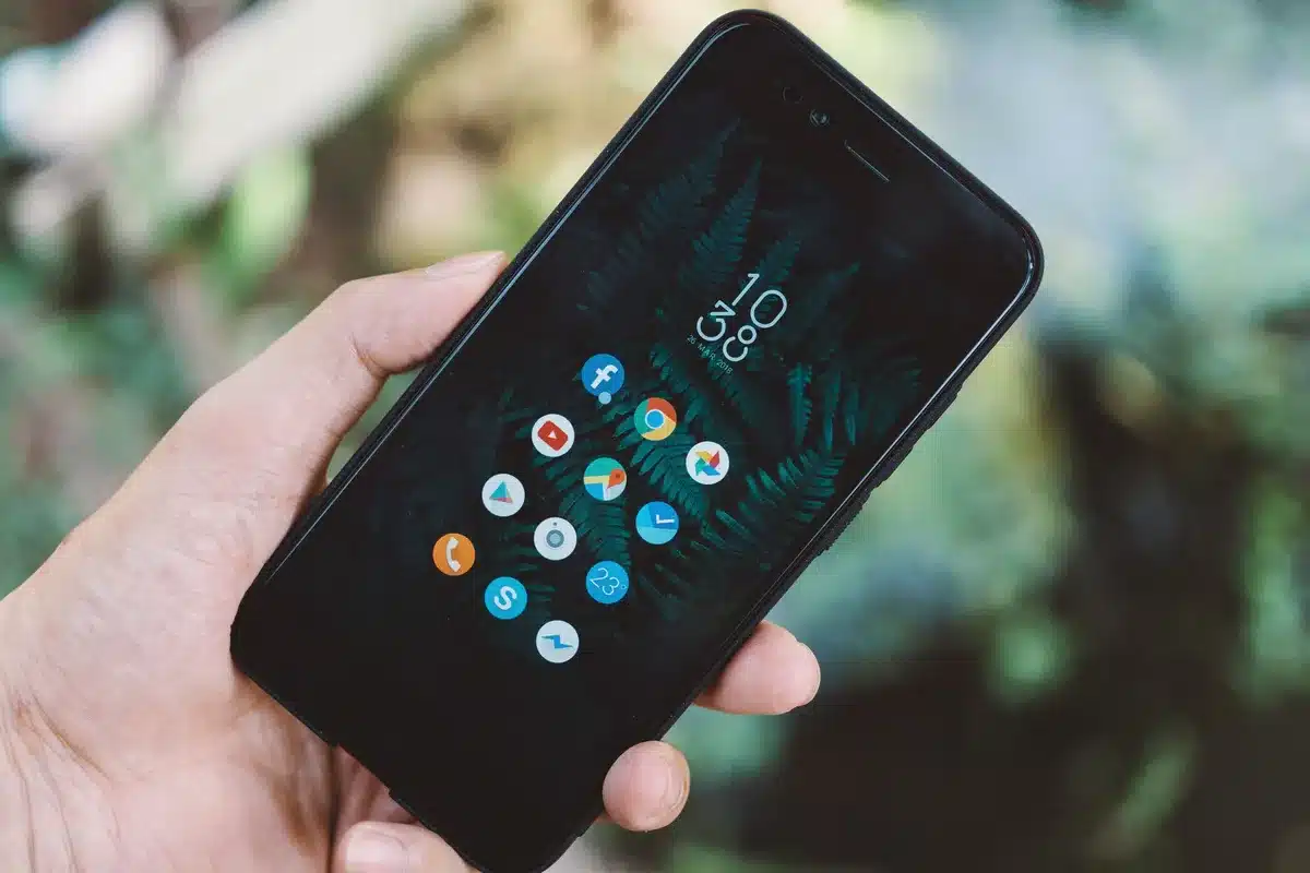 Smartphone showing social media comments and follower reactions